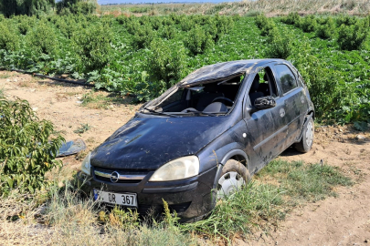 Bursa'da tarlaya uçan otomobildeki sürücü ölümden döndü