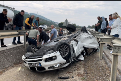 Bursa'da kontrolden çıkan araç takla attı